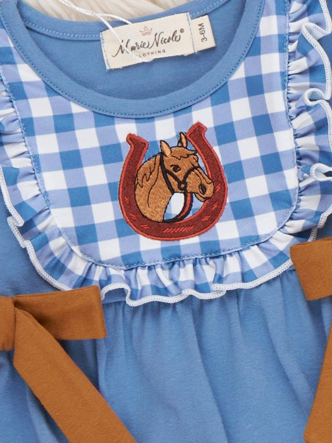 Blue checkered dress with horse and horseshoe design and 'Marie Nicole' label.
