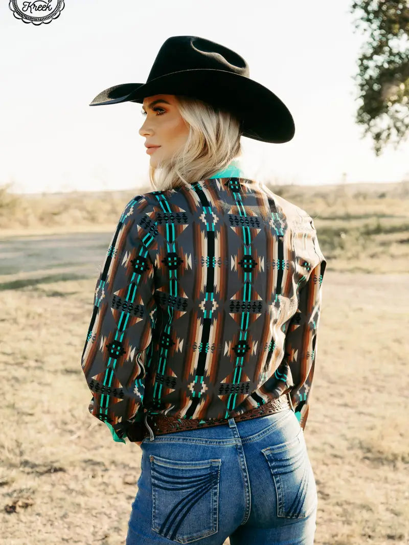 Back view of Rodeo Royalty Duo Red Dirt Road Top for women, showing western print.