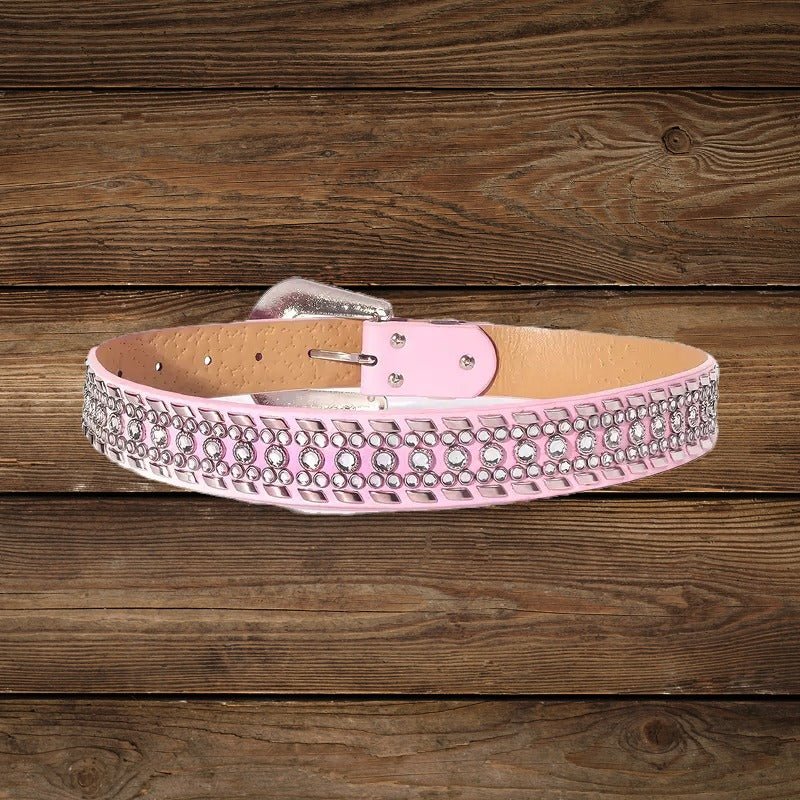 Back view of pink cowgirl belt with rhinestone details and adjustable holes.