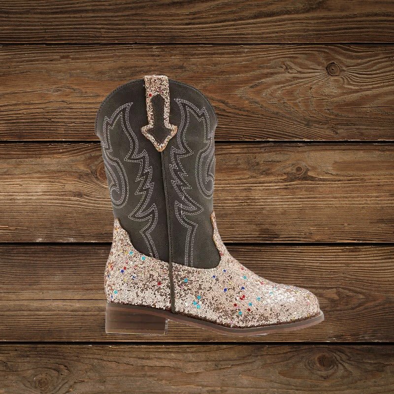 Side view of champagne glitter cowgirl boot with black shaft
