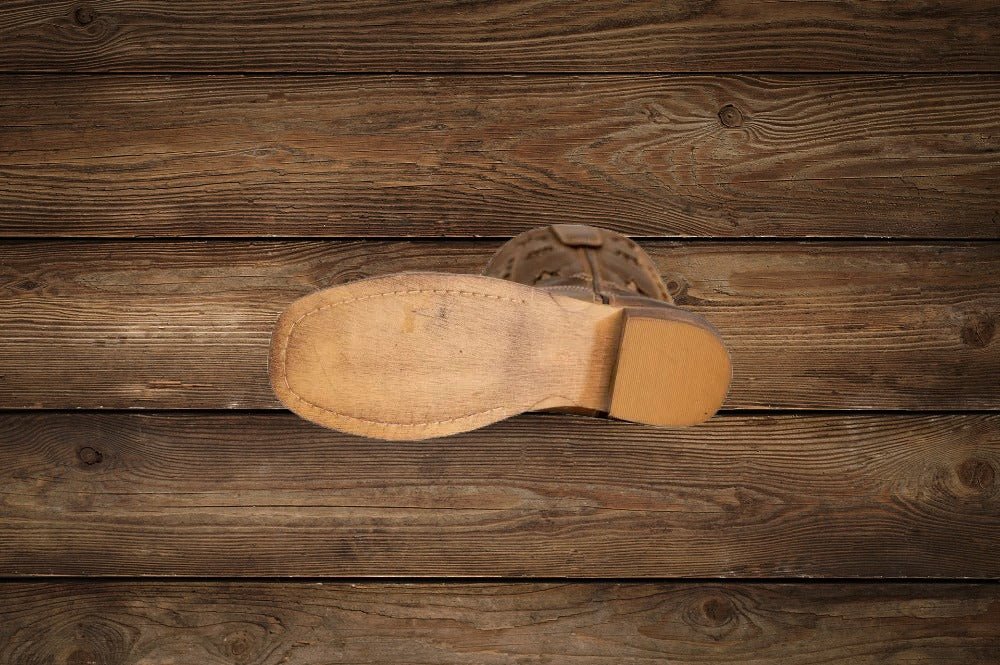 Children's Western boots by TuffRider showing durable rubber sole for riding and ranch wear