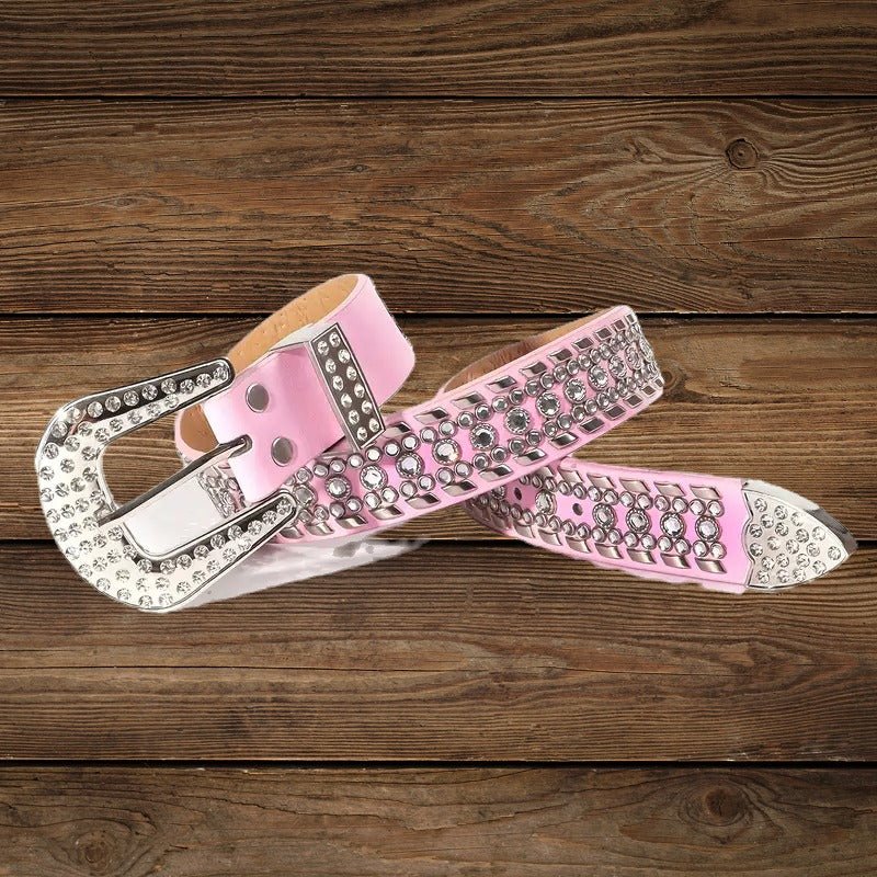 Coiled pink rhinestone cowgirl belt highlighting sparkling stones and Western style.