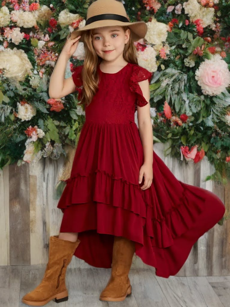 Girl twirling in red high-low ruffle western dress