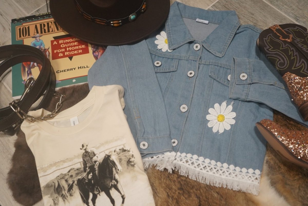 Toddler western denim jacket styled with cowgirl hat, boots, and western shirt for little cowgirls.