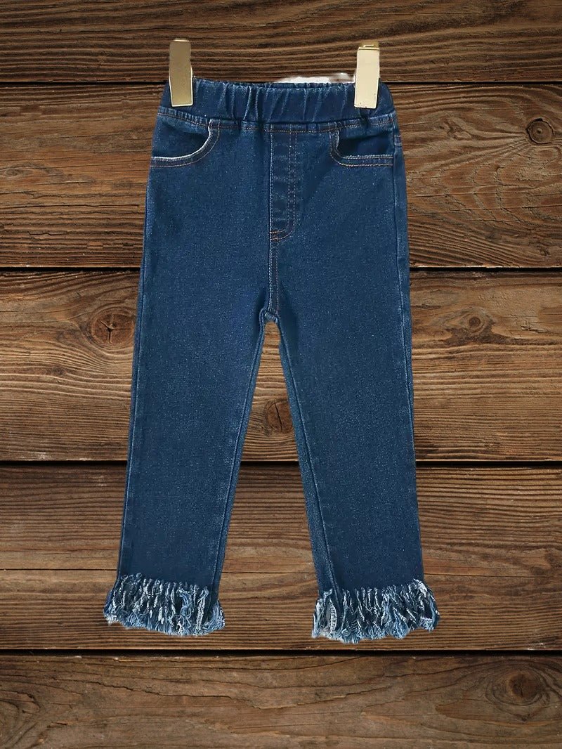 Girls western jeans with full front view on wood background