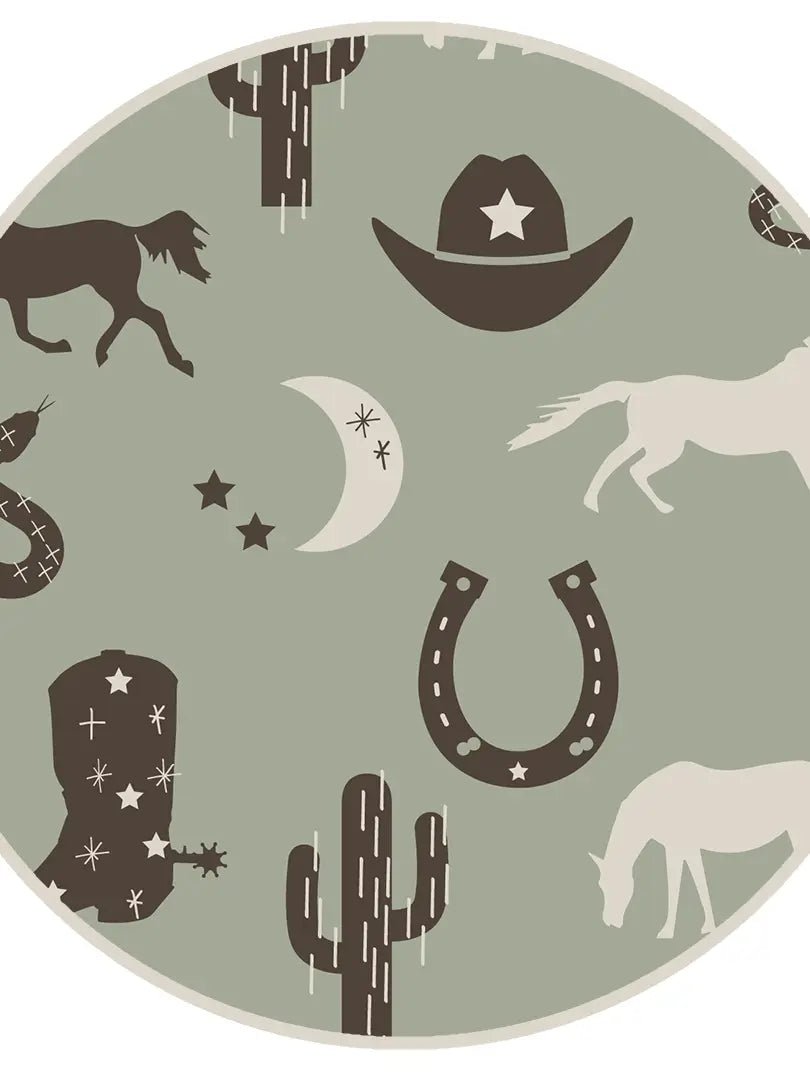 Close-up of horseshoe and boot print on pajamas