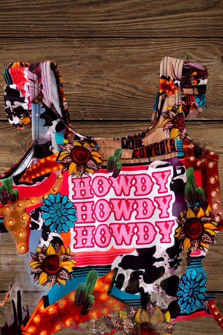 Back view of fringe swimsuit with bold rodeo print