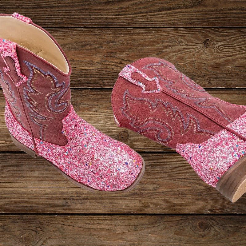 Pink glitter cowgirl boots with square toe and detailed stitching