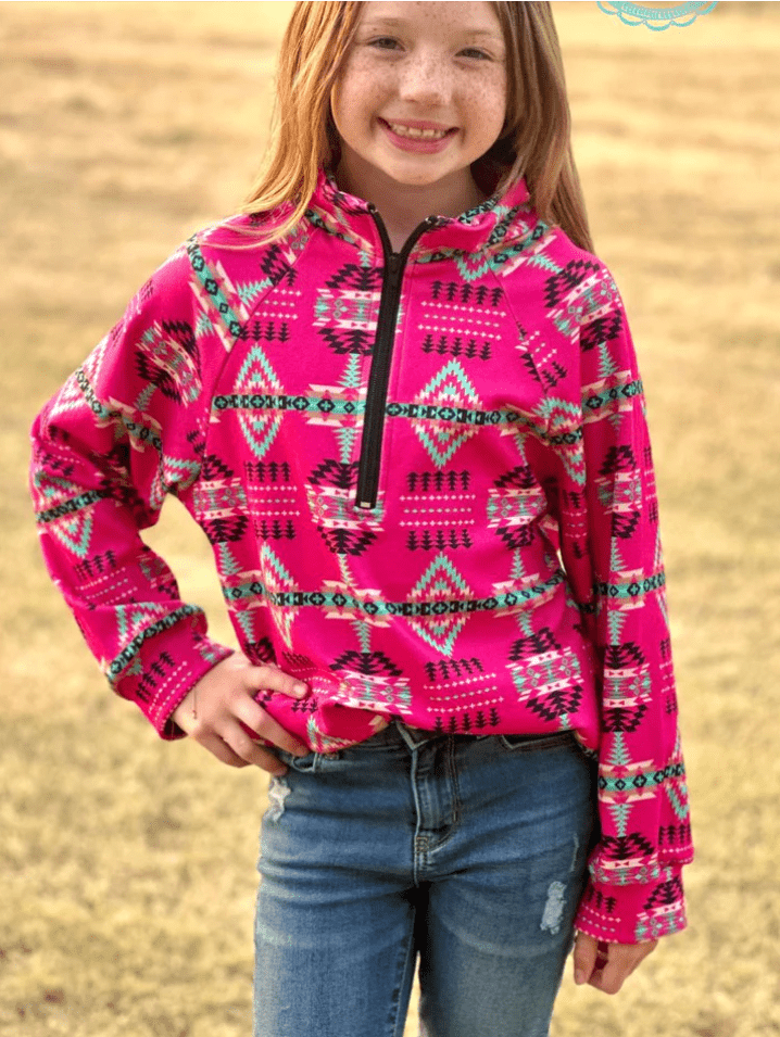 Girl modeling pink quarter-zip Western pullover