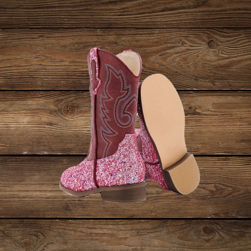 Pink glitter Western boots standing with sole view
