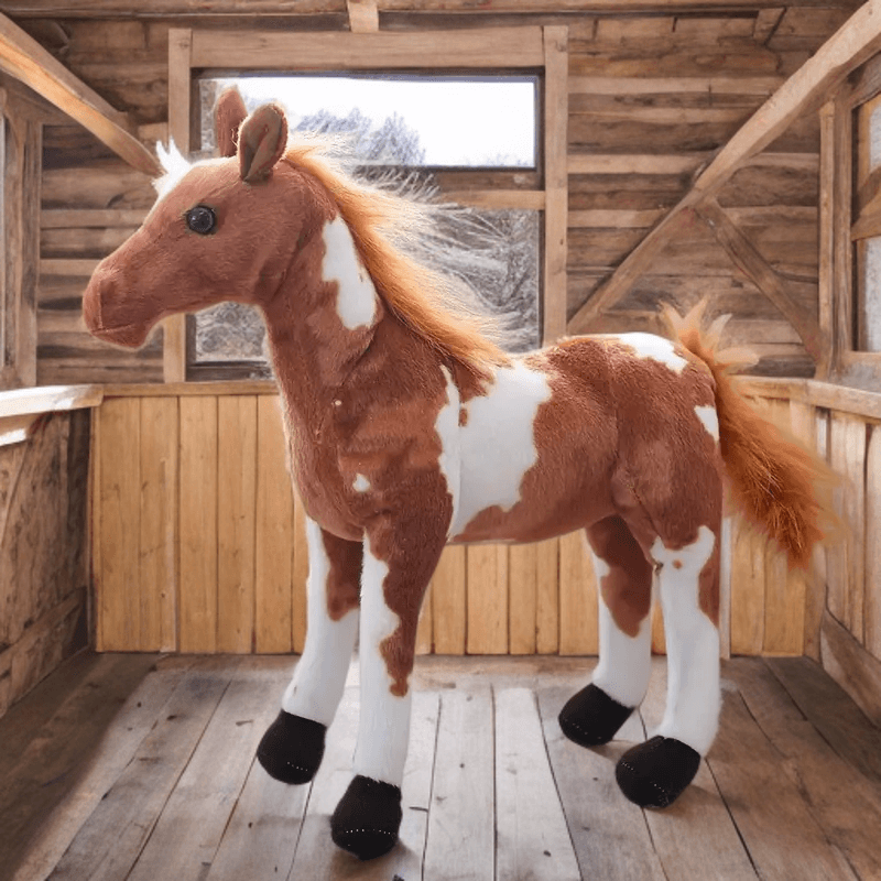 Realistic light brown and white horse plush toy with fluffy mane