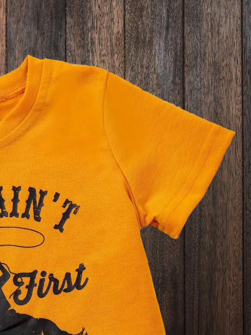 Side angle of western toddler rodeo t-shirt with bold horse lasso design