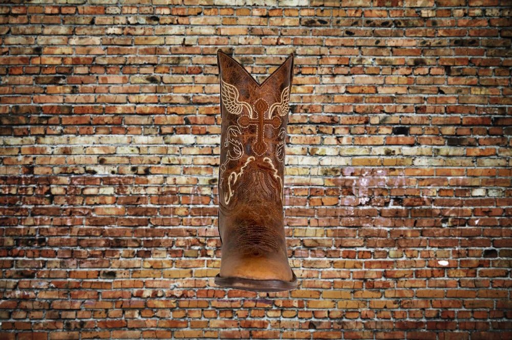 Front view of Tuffrider kids' Western boot showing cross and wing stitching detail.