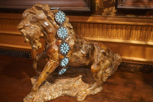Turquoise chain belt for women displayed on western horse sculpture, bold western chain belt with turquoise inlay