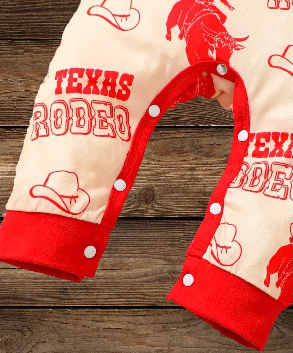 Close-up of baby romper featuring Texas design