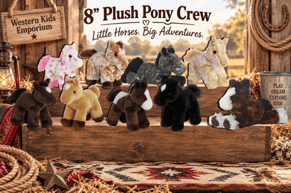 A set of nine plush pony stuffed animals in various colors and patterns, arranged on a rustic wooden crate in a western-themed setting with a sign reading '8" Plush Pony Crew' and 'Little Horses. Big Adventures.