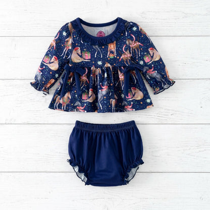 Christmas horse print baby set with a navy long-sleeve ruffle top, two waist bows and matching navy bloomers.