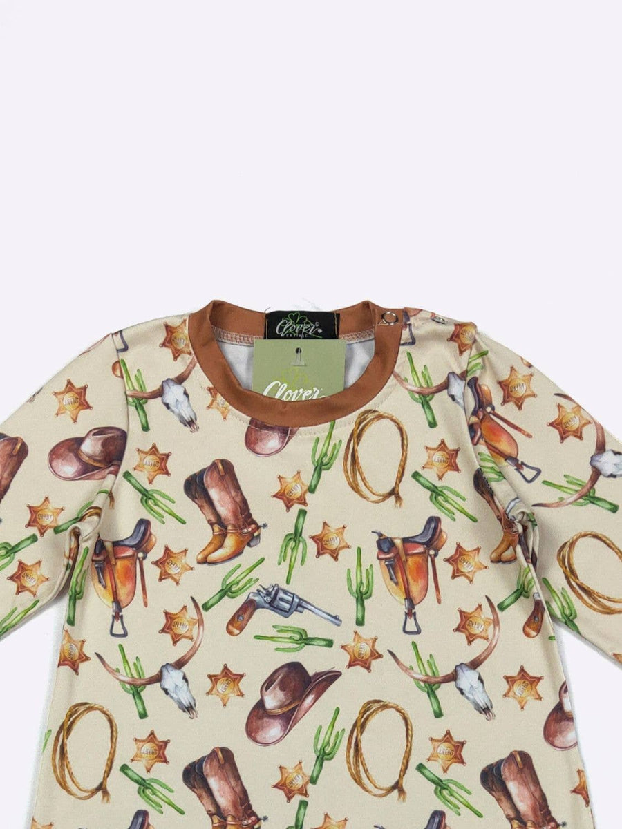 Baby onesie with cowboy pattern on a white background