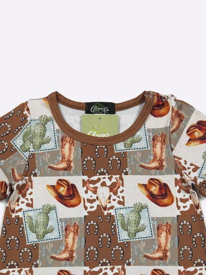 cowboy baby romper with cowboy-themed pattern on a white background