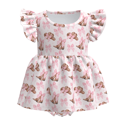 Children's dress with hat and bow pattern on a white background