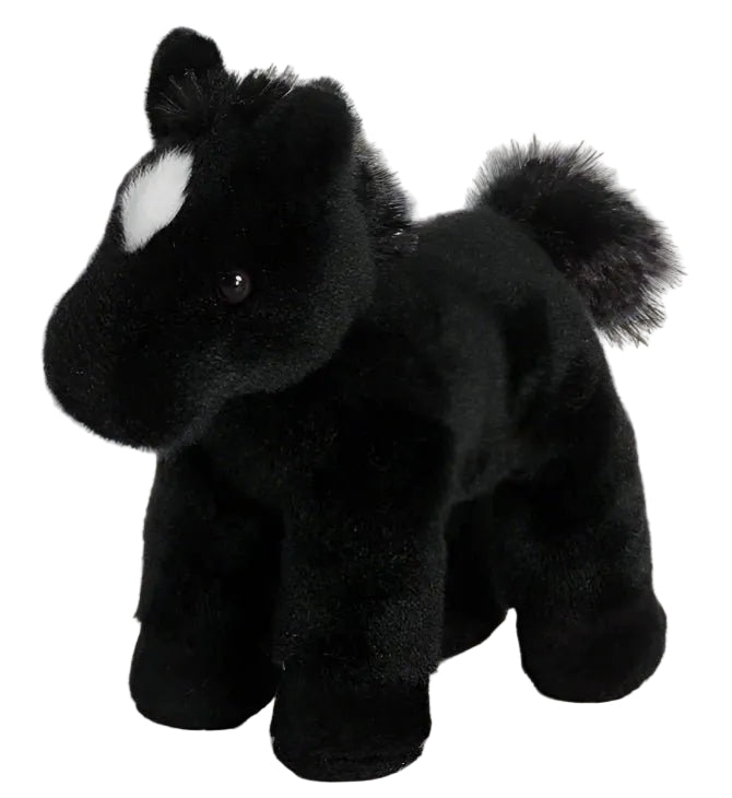 Black plush horse toy on a wooden floor with star patterns