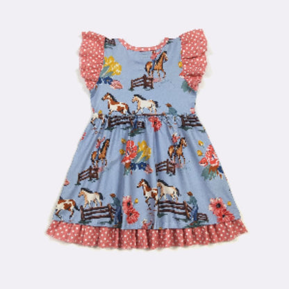 Children's dress with horse and floral pattern on a light blue background