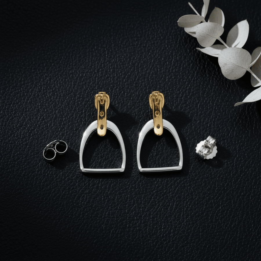 Two-tone gold silver English stirrup earrings on black leather - equestrian jewelry for girls young riders horse show gift