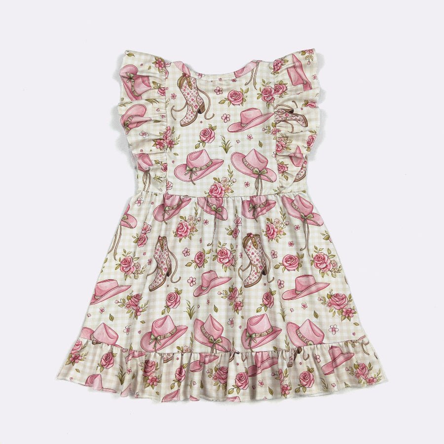 back of boots and cowgirl hat dress