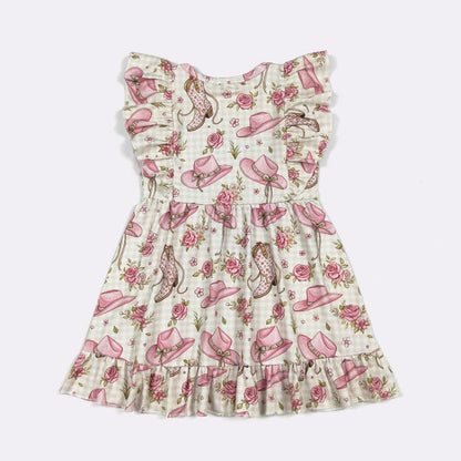 back of boots and cowgirl hat dress