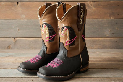 Brown cowgirl boots with pink