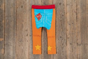 Baby's leggings with western chap design on an orange background