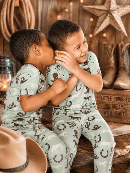 Little cowboys in western pajama sets