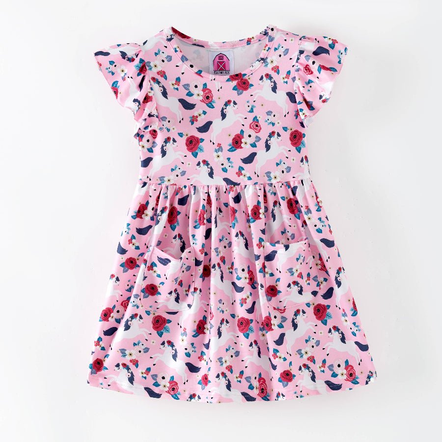Pink floral dress with pony pattern on a white background