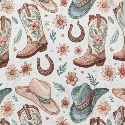 Pattern of cowboy boots, hats, and flowers on a light background