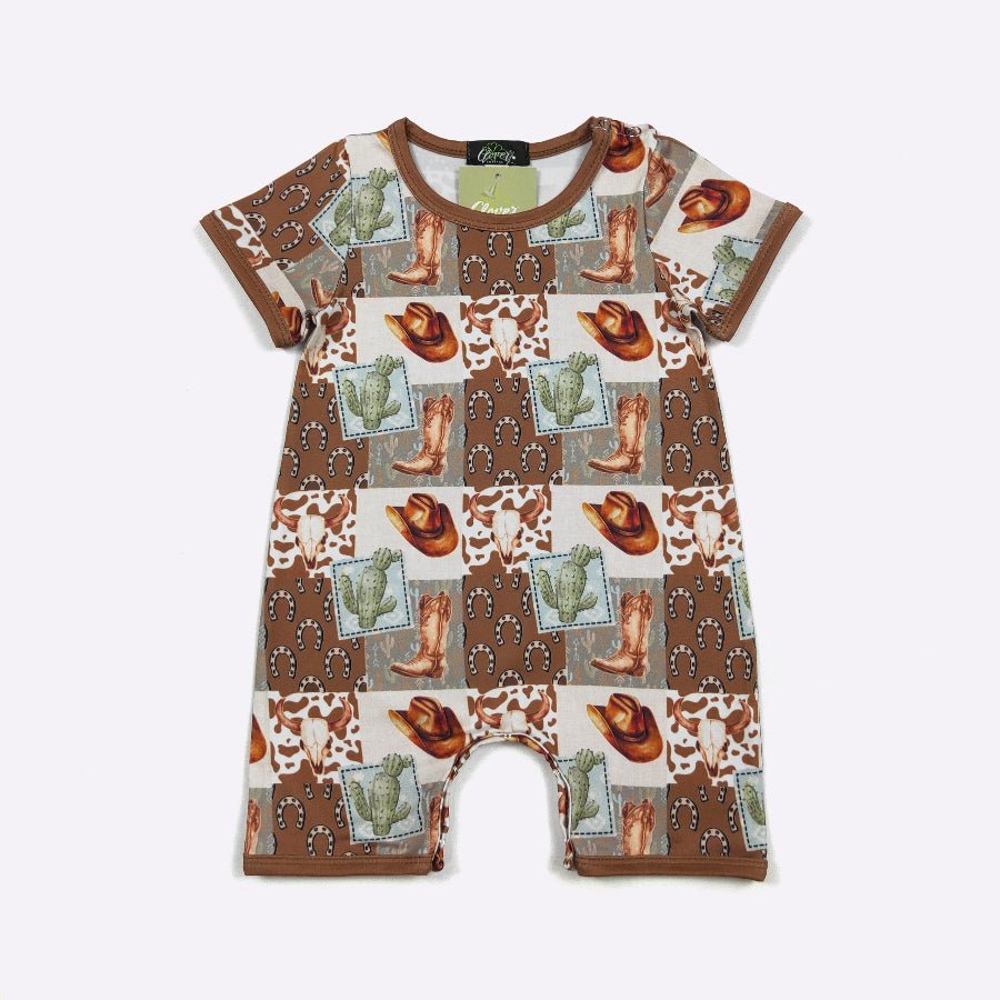 Children's romper with cowboy print on a white background