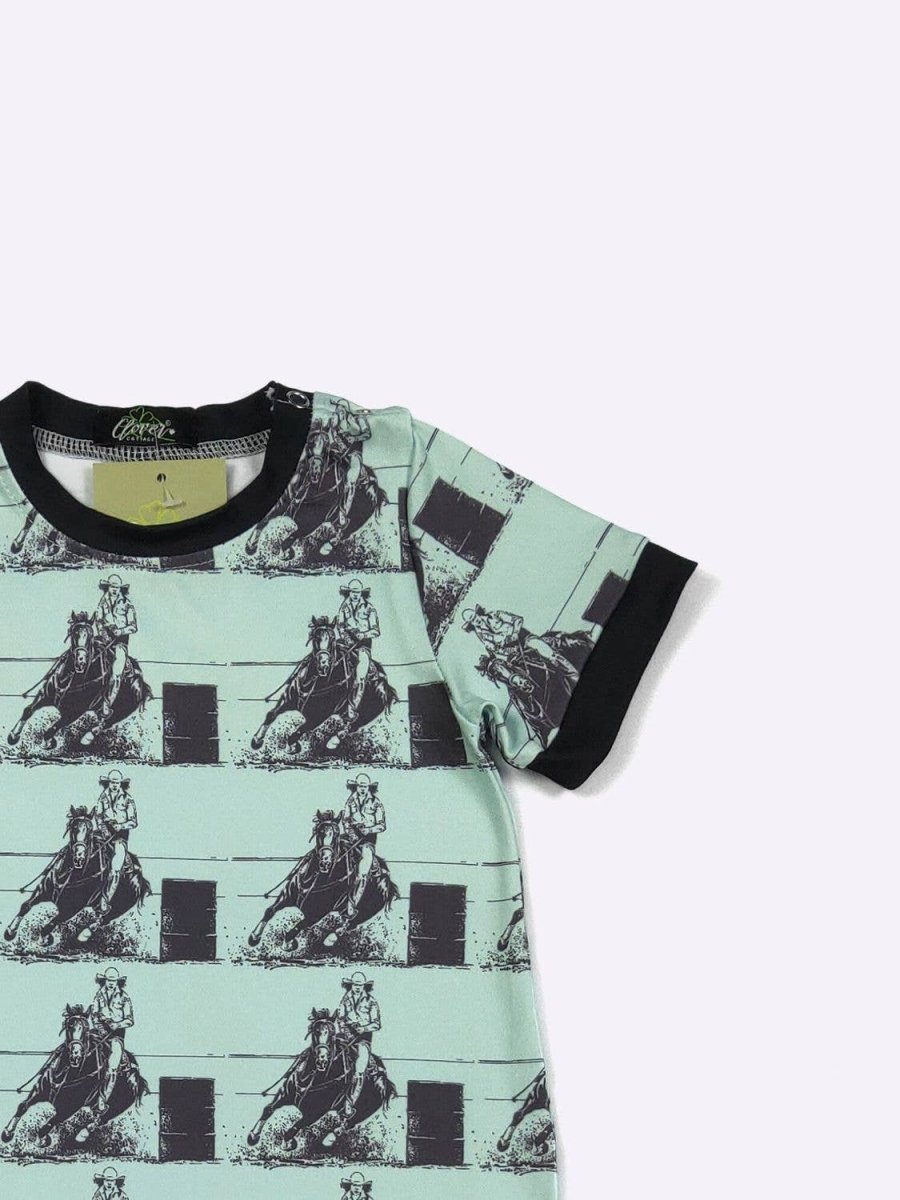 Romper with horse print on a light green background