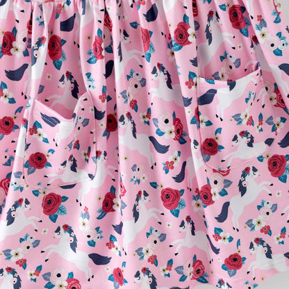 Pink fabric with pony and floral pattern