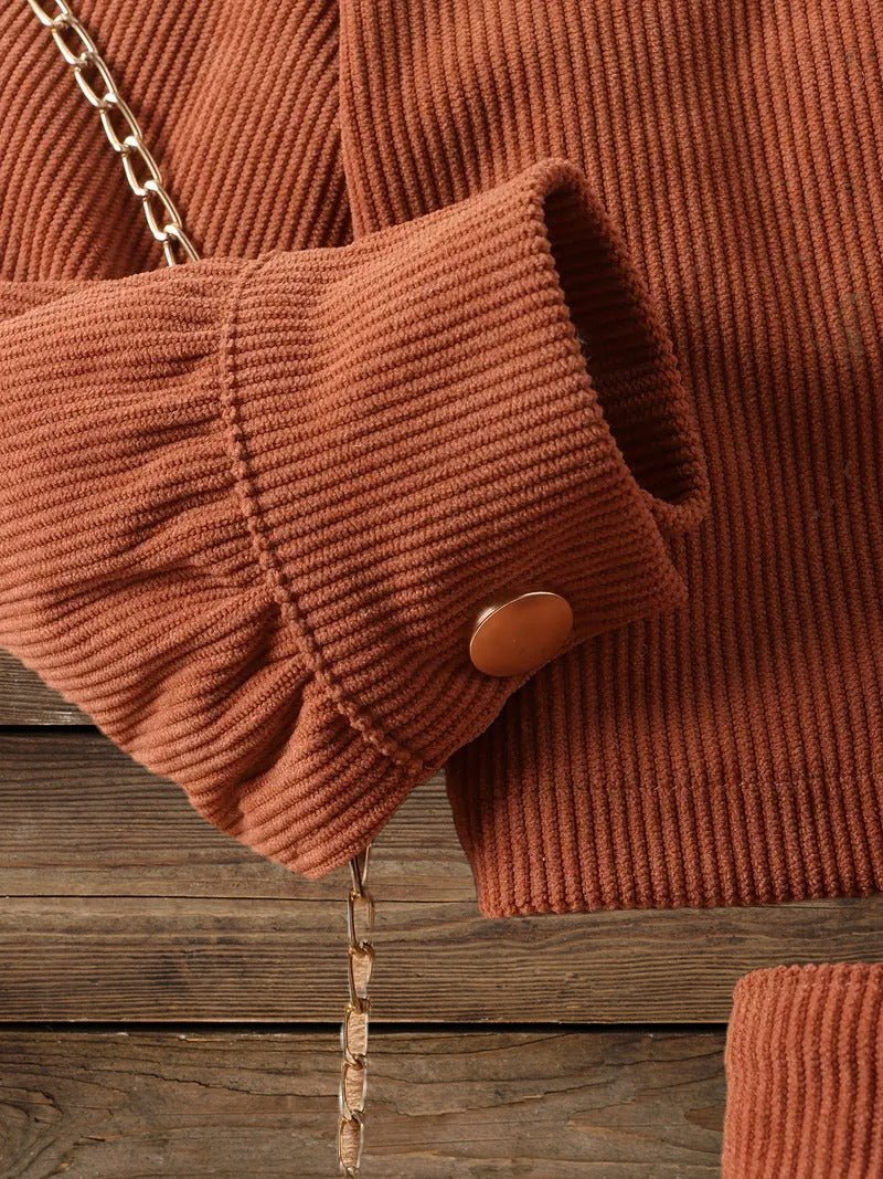 Close-up of Aztec pattern on girls corduroy jacket