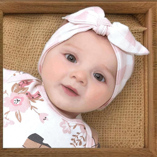 Baby girl wearing soft pink western cotton headband
