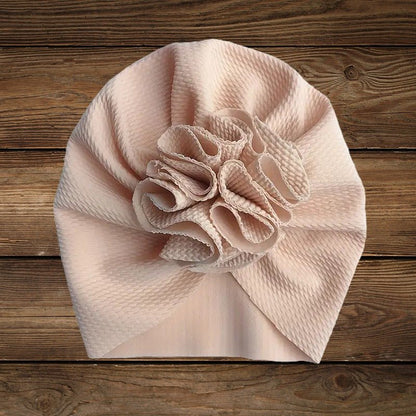 Beige baby turban hat with floral front knot