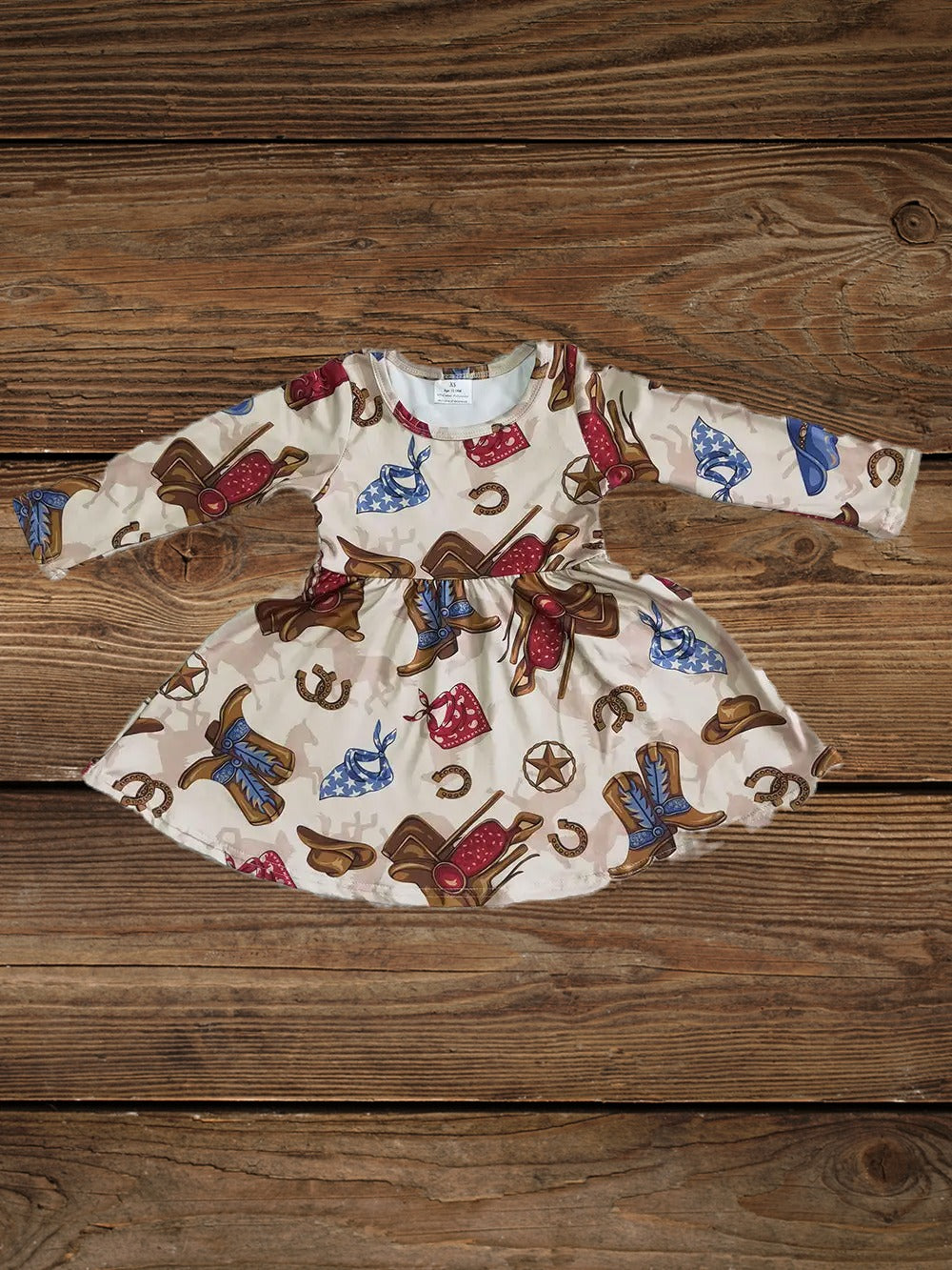 Beige little girl western dress featuring cowboy hats and boots print, ideal for little adventures dress up and cowgirl outfits