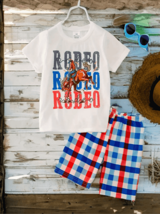 Boys’ Rodeo Star shirt and plaid shorts flatlay