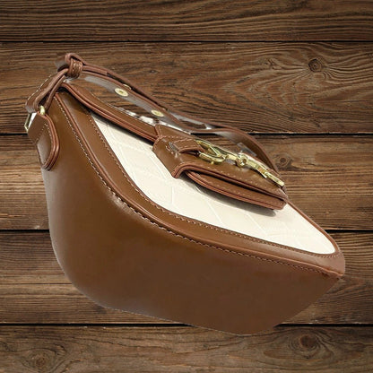 Side view of equestrian style vegan crossbody bag