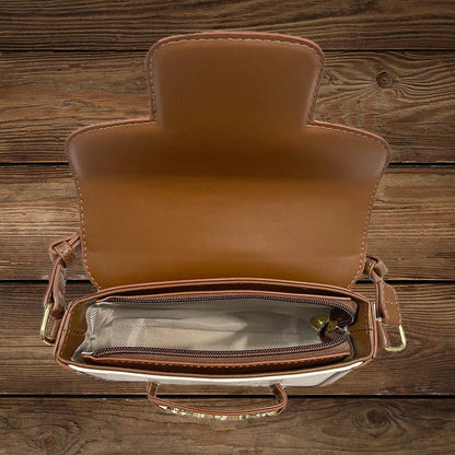 Inside view of brown and white vegan leather purse