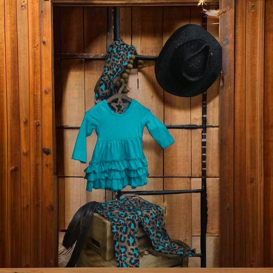 Cow print ruffle top with leopard pants and headband