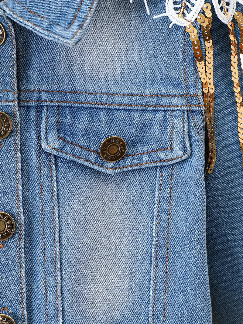 Front chest pocket and button details on Glitter & Glamour Girls' Sequin Tassel Denim Jacket.