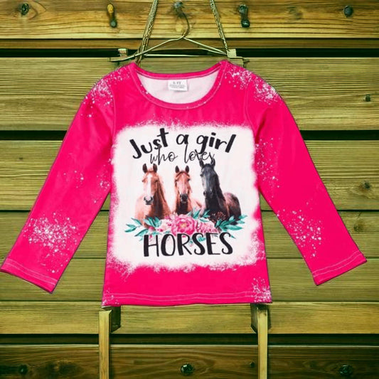 Pink "Just a Girl Who Loves Horses" western long sleeve t-shirt for kids with horse graphic on hanger