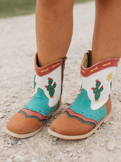 Close-up of toddler wearing Pecos Cactus Boots