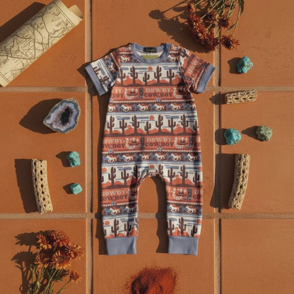 Howdy aztec baby cowboy romper