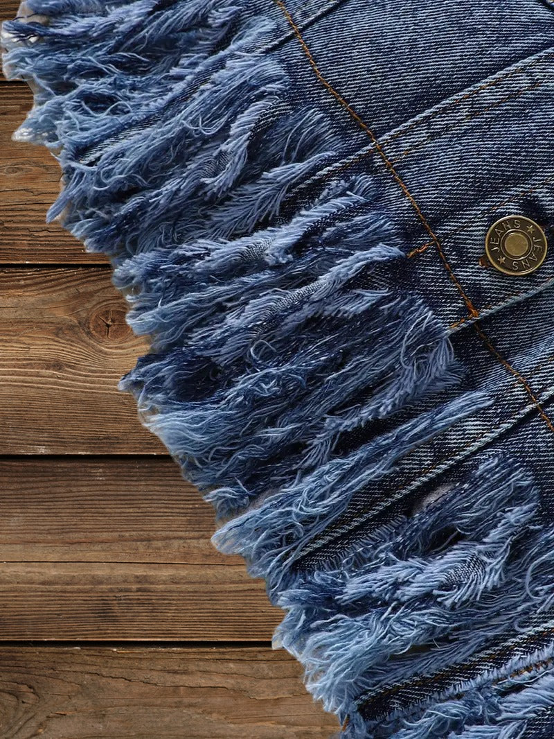 Close-up of frayed hem detail on Little Wrangler Raw Hem Denim Jacket for kids
